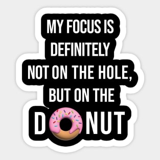 My focus is definitely not on the hole, but on the donut. Sticker